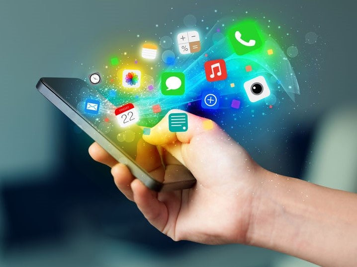 Smartphone with app icons emerging from the screen
