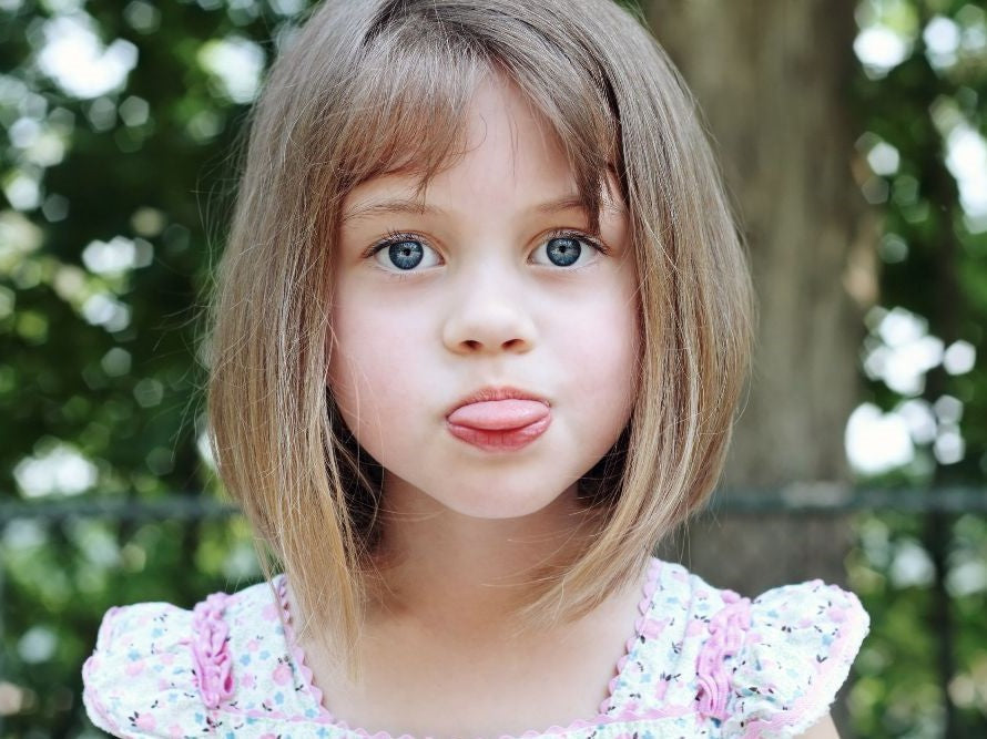 Girl sticking out her tongue