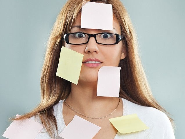 Woman covered with sticky notes